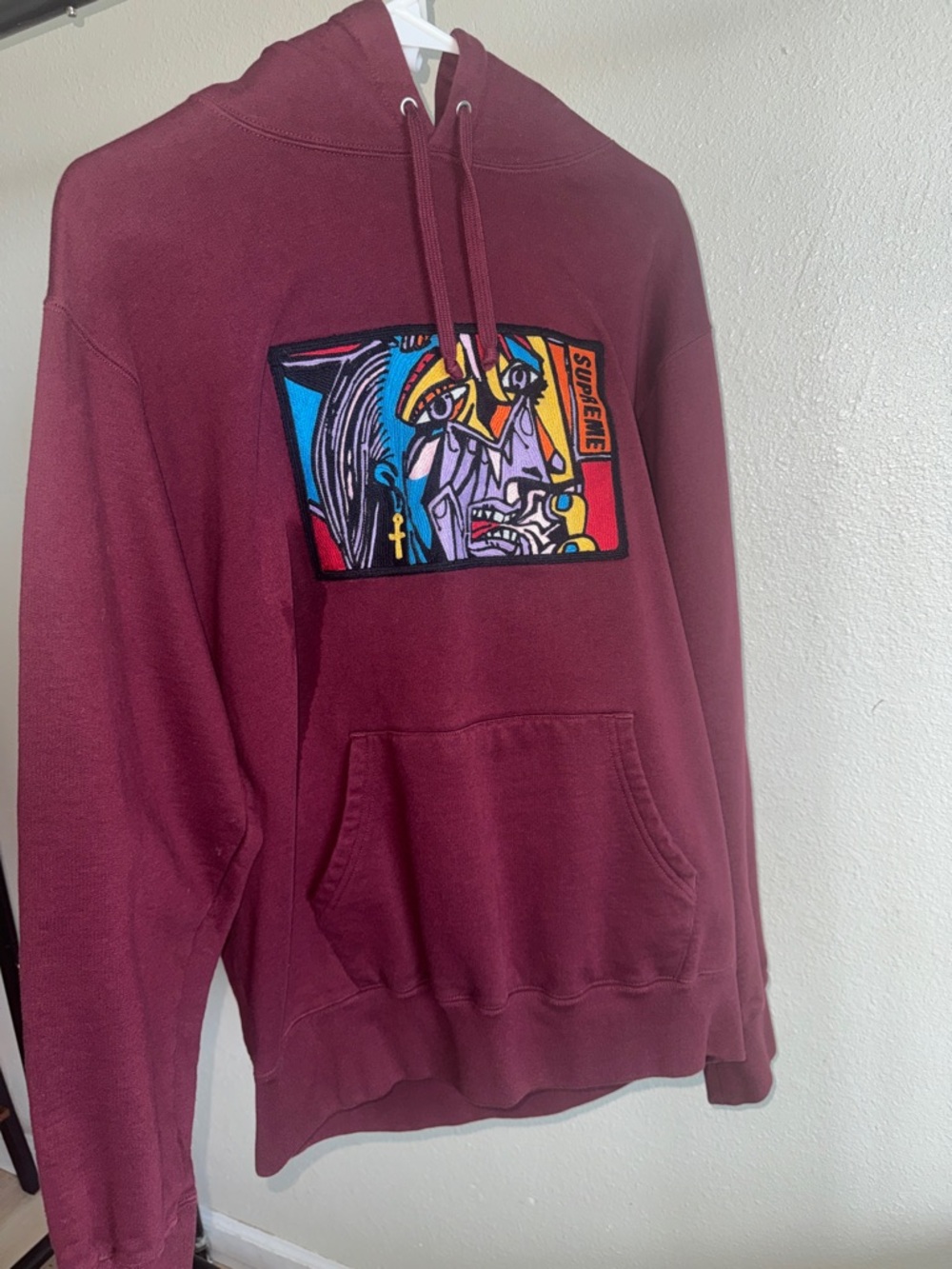 Supreme Burgundy Crewneck Hoodie with Multicolor Graphic Patch